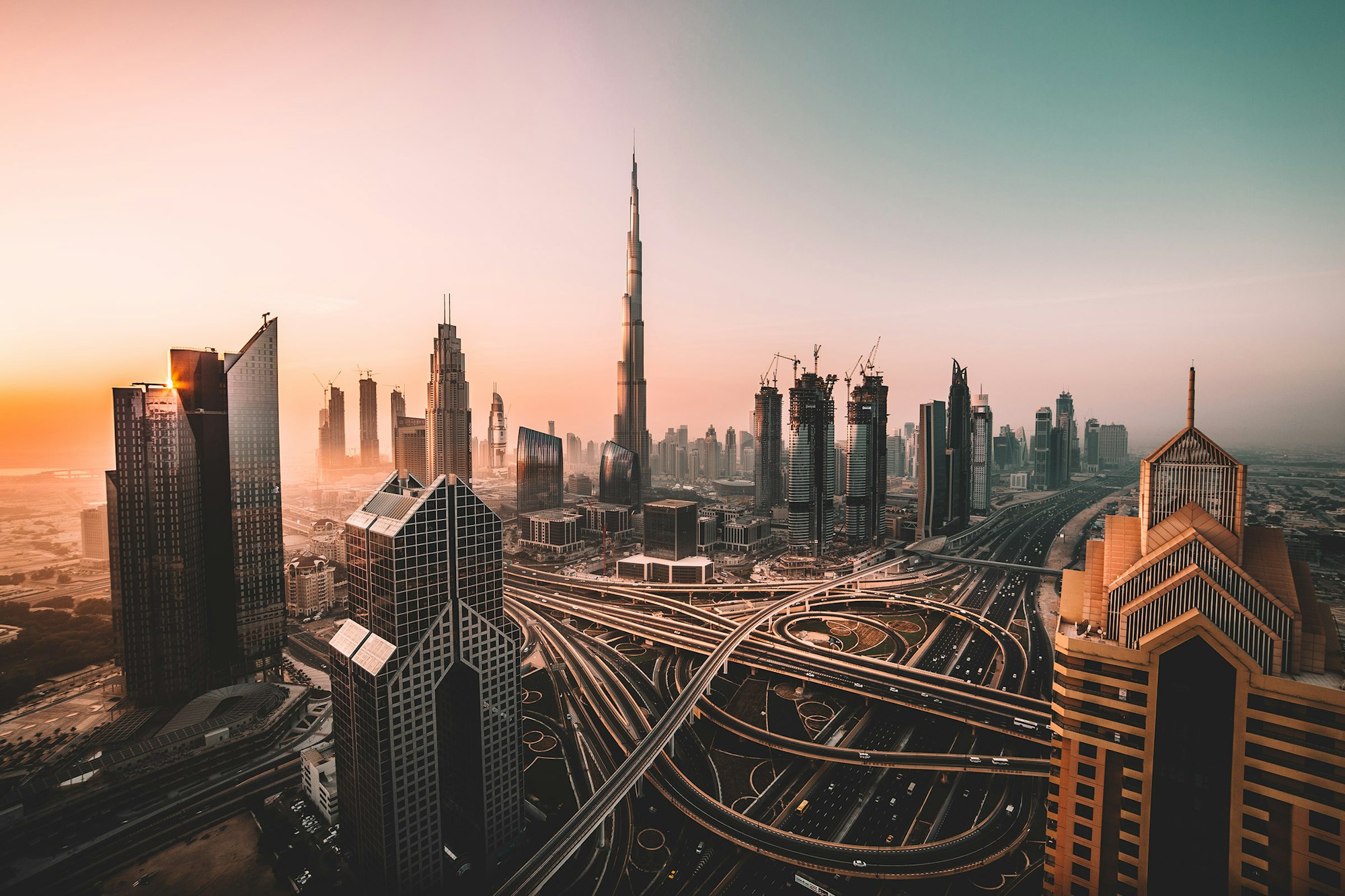 Dubai commercial skyline at sunrise